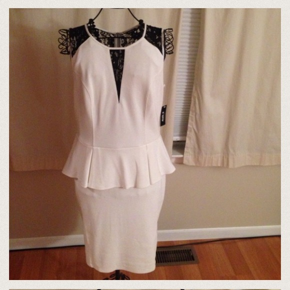 White and black peplum dress