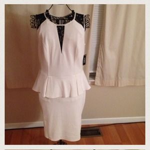 White and black peplum dress