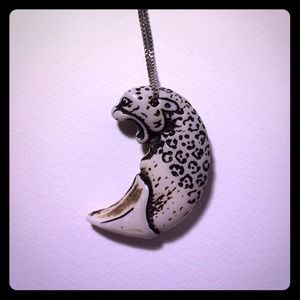 Tooth leopard necklace.