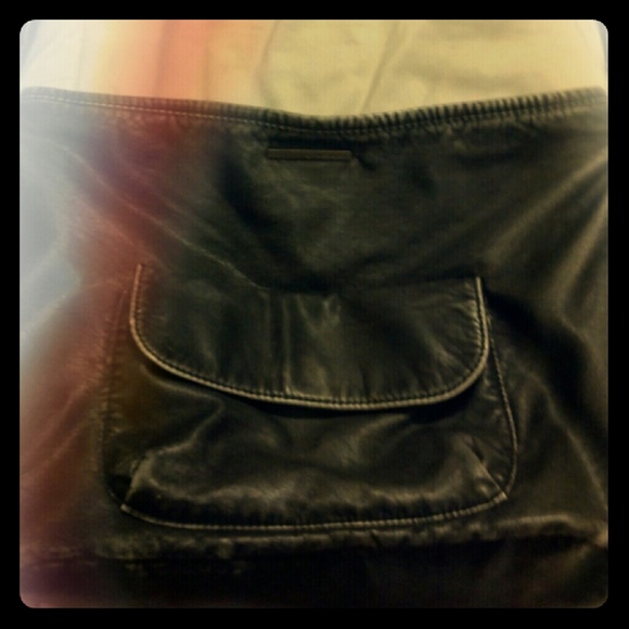 O'Neil brand messenger bag with guitar strap.