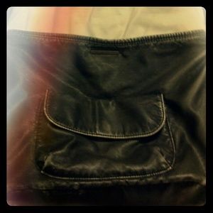 O'Neil brand messenger bag with guitar strap.