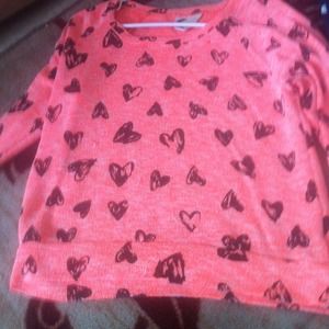 Bright orange knit sweater