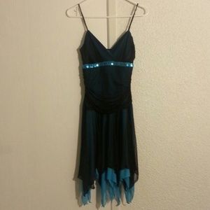 Black/blue dress with sequins.