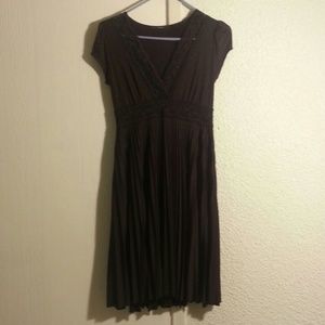 Brown dress w/ lace and pleats.