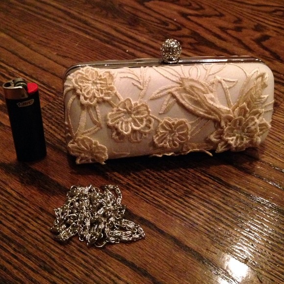Evening clutch with jeweled clasp and appliqué 🌸