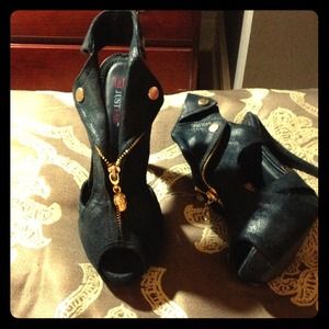 Leather jacket inspired black high heels.