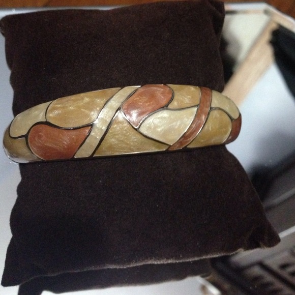 3 for $12. Tan and silver bracelet