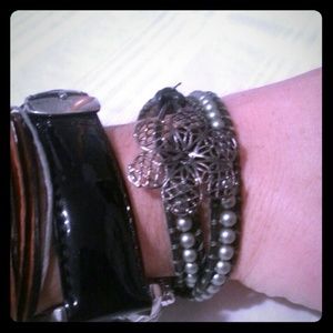 Leather beaded wrap bracelet with flower button