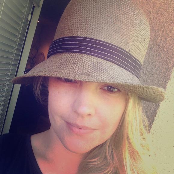 Brown straw cloche-style hat.
