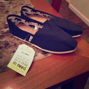 Brand new Toms