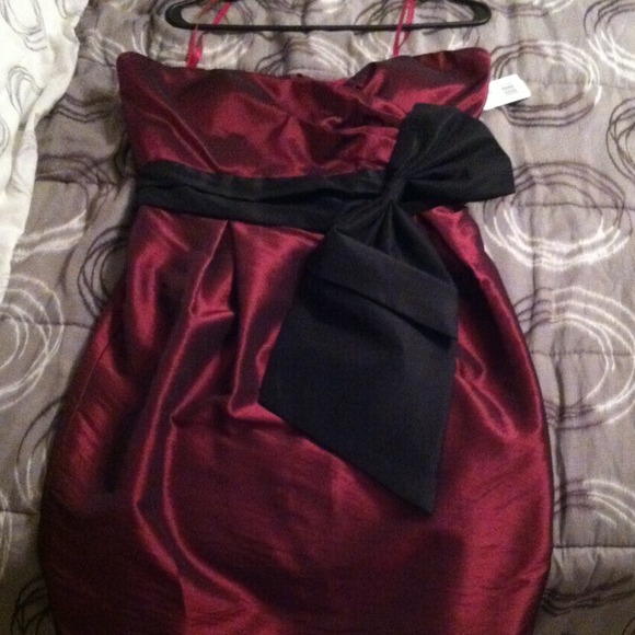Nwt! Shiny red with a black bow