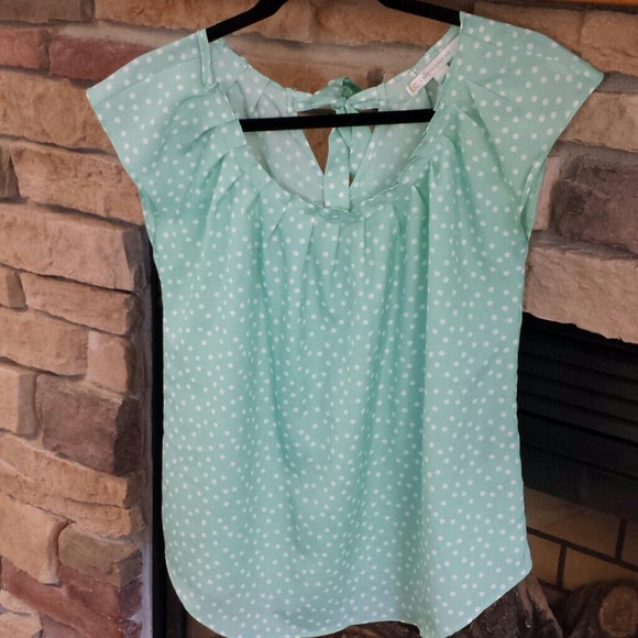 Lauren Conrad Sleeveless polka dot shirt.