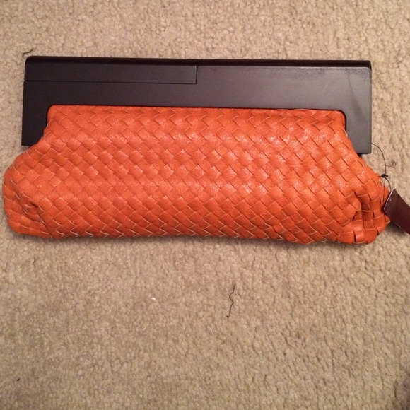 Orange weaved leather clutch