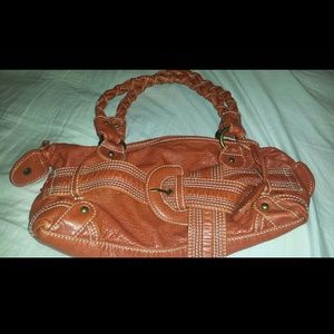 red purse by Marc Ecko