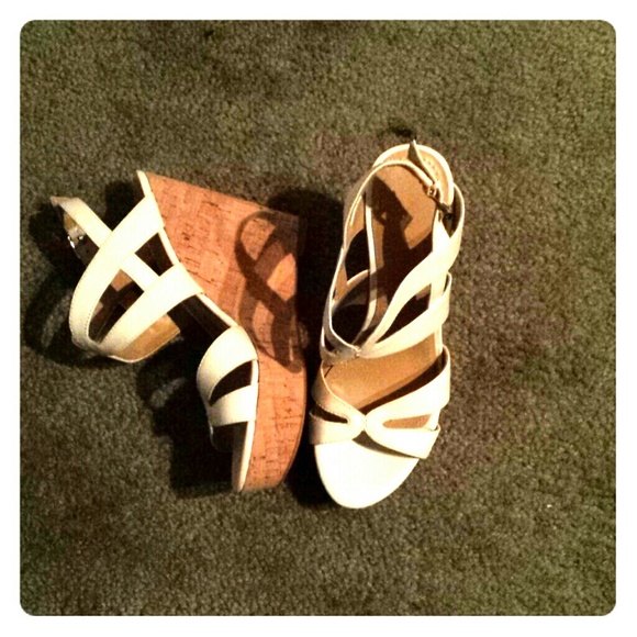 White strappy sandals with cork bottom
