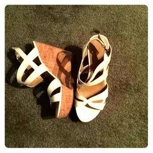 White strappy sandals with cork bottom