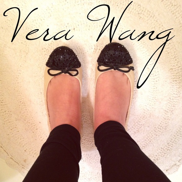NWOT Simply Vera Wang flats with spikes!