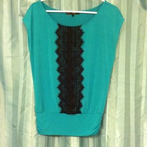 Green/teal top with lace