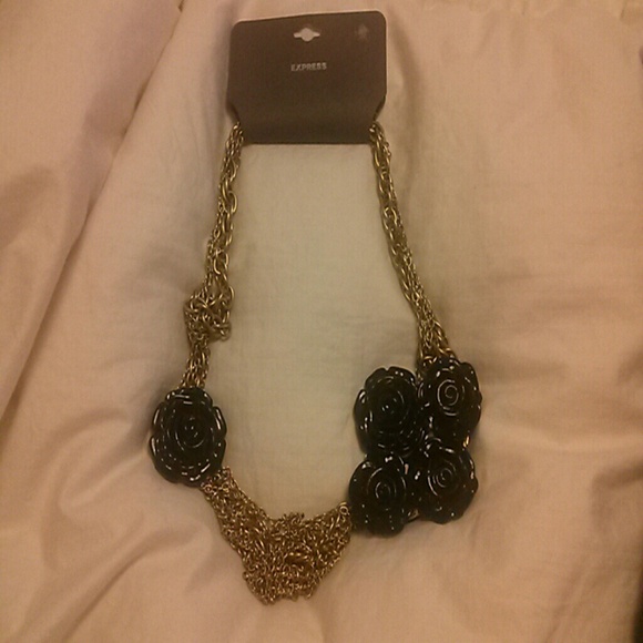 FREE WITH PURCHASE OF ADDTL ITEM Express necklace.
