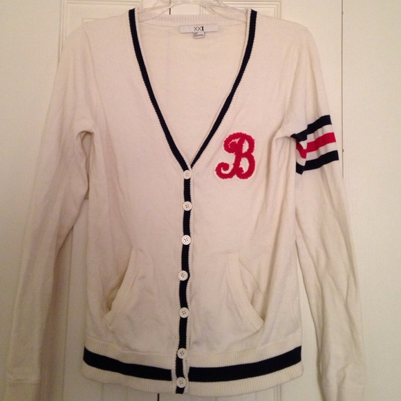Cream "B" monogram cardigan.