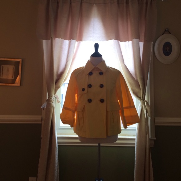 Beautiful yellow rain cape coat