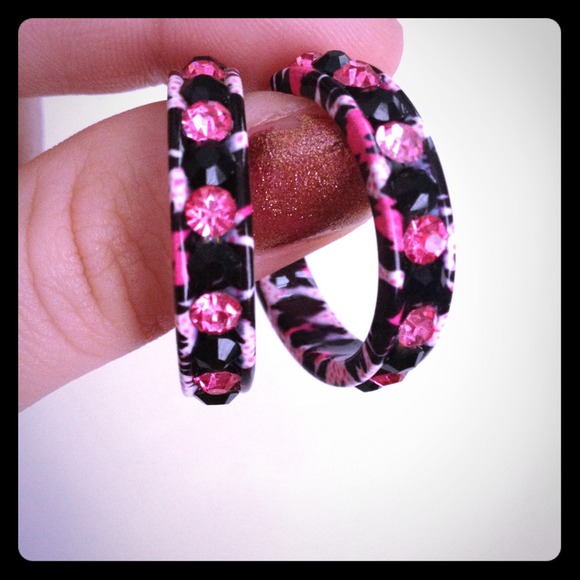 Pink and black rhinestone zebra hoop earrings.
