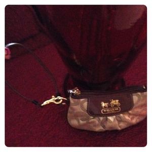 Authentic gold coach waist purse..