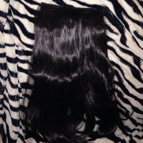 Clip in extension. Beautiful black color.
