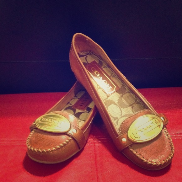 Leather brown flats .