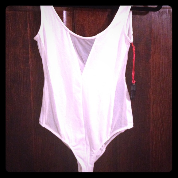 Plain white one piece tank w/shear vneck and sides