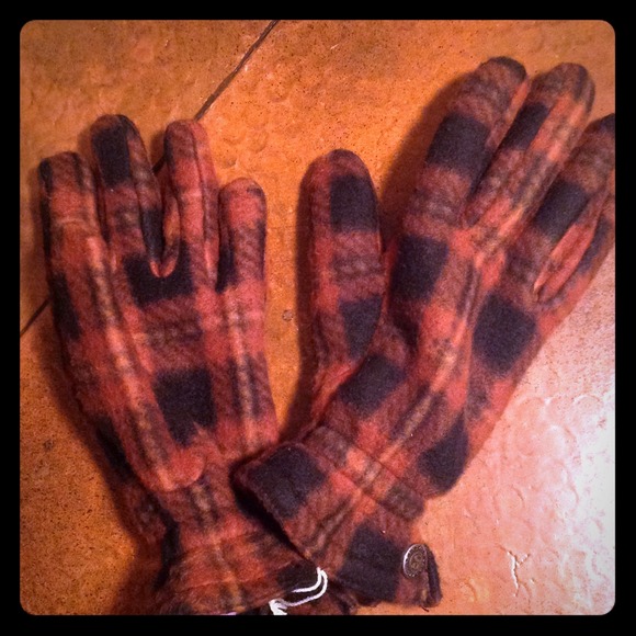Orangish/brownish and black fleece gloves