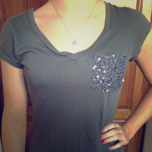 Olive top with sequin pocket!