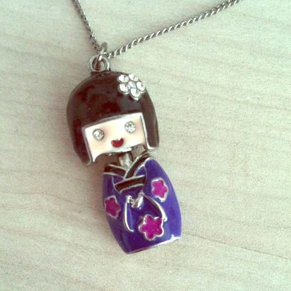 Asian bobble head lady necklace