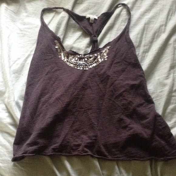 Cute black tank with silver beads.