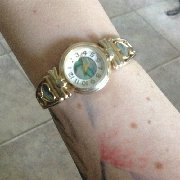 Beautiful stainless steel watch with heart design
