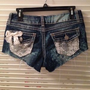 Denim shorts with lace detail