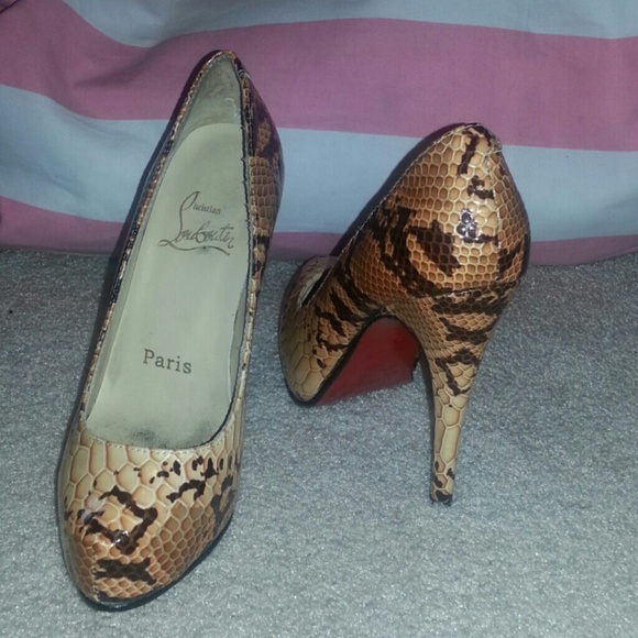 CL snakeskin heels