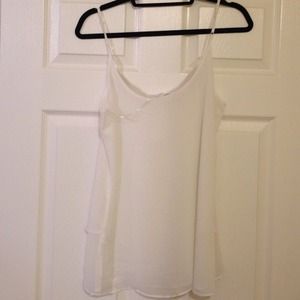 White top with silver beading