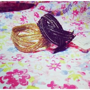 Bracelets: black and gold
