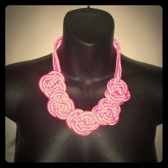 Neon pink knot necklace