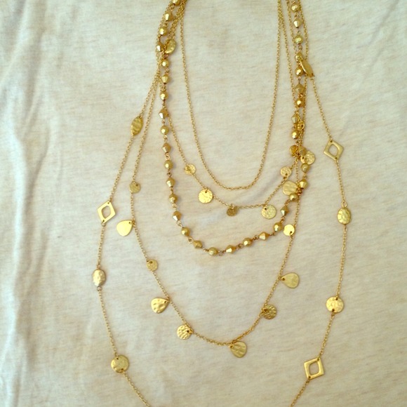 SOLD Multi strand gold necklace.