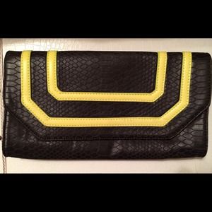 Crocodile skin Clutch with lime green accents.