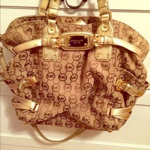 Michael Kors tan and gold large ganesvoort bag.
