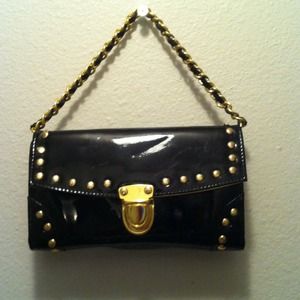 Small black and gold purse