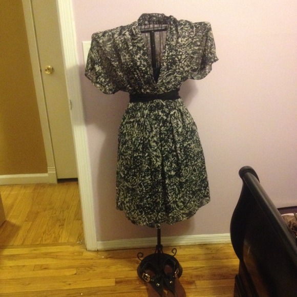 Black and cream knee length dress