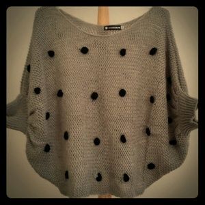 Grey sweater with black faux fur polka dots