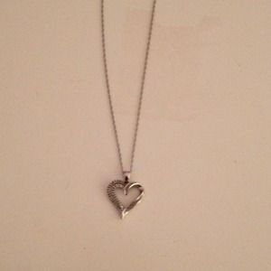 Heart necklace with crystal studs.