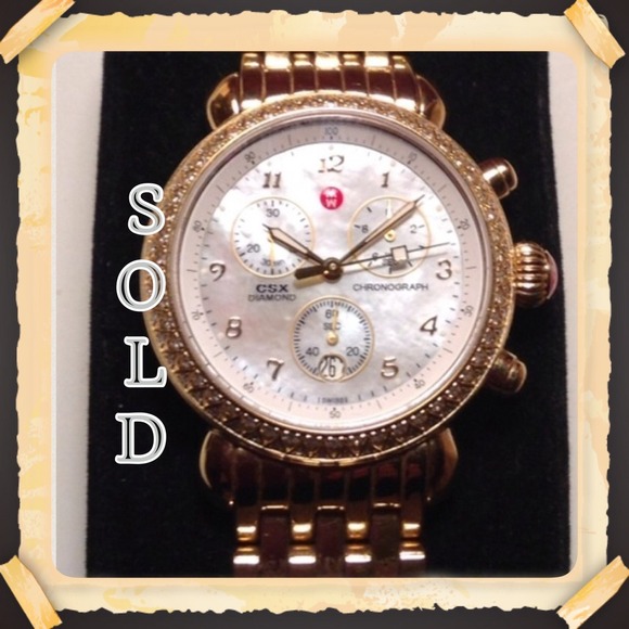 SOLD. !!' Gold tone diamond Michele watch