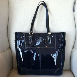 Sold  authentic, navy blue large tote. NWOT
