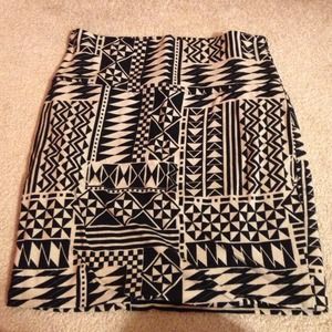 short, body hugging, Aztec skirt.
